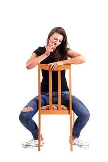 Legs Apart Chair Women Sitting - Сток картинки - iStock