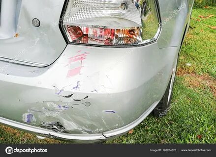 Minor dent scratches on bumper of car involved in accident S