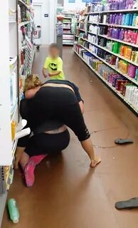Video: Little Boy Helps His Mom Beat A Woman In Walmart - WO
