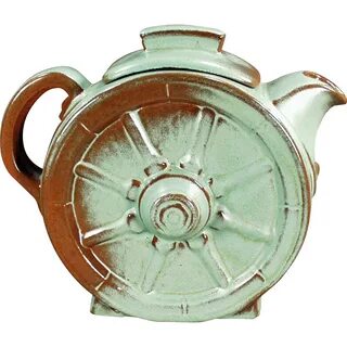 This 6 cup Teapot was made by the Frankoma Potteries of Okla