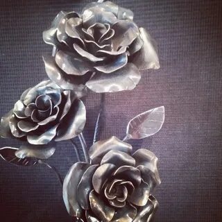 Blacksmithed roses Made by Thymelyglass Studio Eldon, IA Met
