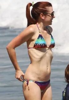 Alyson Hannigan wears a "Colorful Bikini" as she holidays wi