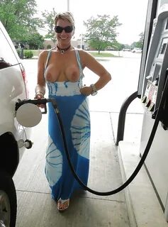 Lady shiws boobs at gas station