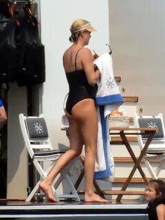 Charlize Theron - In a black swimsuit in Greece-12 GotCeleb