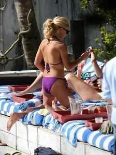 Katherine Jenkins cleavage in purple bikini in Miami Celebs 