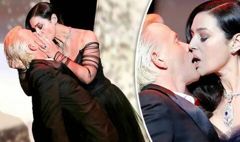 Monica Bellucci, 52, passionately KISSES co-host Alex Lutz o