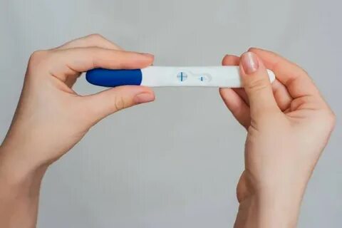 Woman Holding Positive Pregnancy Test Her Palm Stock Photo b