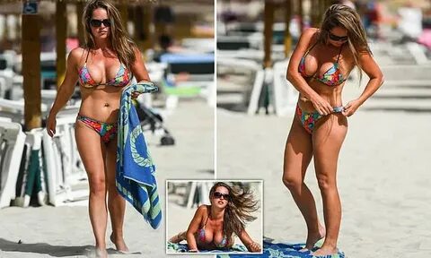 Karen Danczuk shows off famous cleavage on Spanish beach
