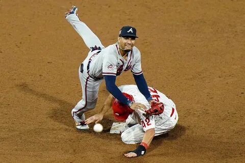 Braves score 10 runs in one inning, then fight to hold off P