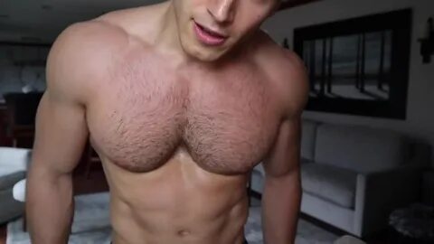 Sam Cushing shirtless on his home workout video