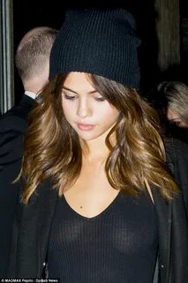 Selena Gomez goes completely braless in sheer black top