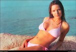 Rebecca Ferguson's 49 Hottest Bikini Photos Shake Your World