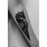 Sisyphus tattoo on the left inner forearm. Fotografia criati