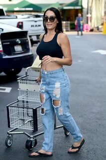 Nikki Bella wore a black cropped tank and ripped jeans while