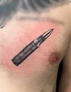 Bullet tattoo: meaning, best photos and sketches