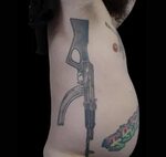 40 Mind Blowing Gun Tattoos On Rib - Tattoo Designs - Tattoo