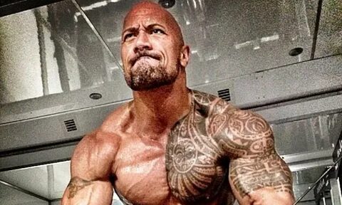 Dwayne Johnson as Hercules: The Rock grimaces as he works on