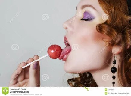 Woman licking candy stock image. Image of lips, desire - 127