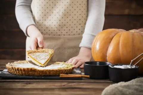 Woman cooks pumpkin pie stock image. Image of food, cooking 