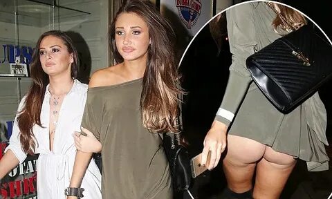 Megan McKenna is propped up by a friend as she accidentally 