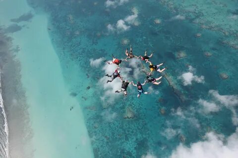 Jump into the Great Blue Hole off the coast of San Pedro Bel