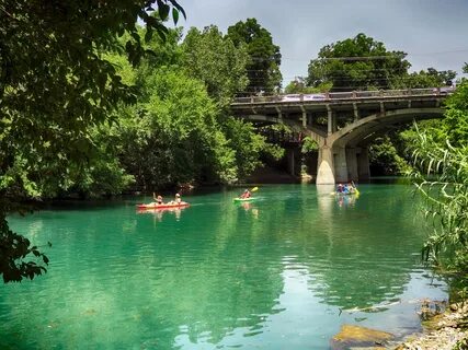 Kayaks on Barton Creek with Barton Springs Rd. Bridge - Free