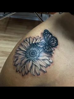 Daisy and butterfly tattoo by Audrey Mello Butterfly tattoos
