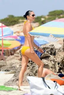 Jennifer Connelly in a Yellow Bikini - Beach in Formentera, 