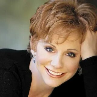 Reba McEntire She is just to awesome for words Really short 