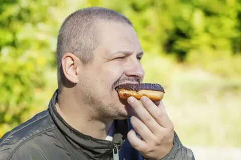 Man eating donuts stock photo. Image of figure, fatness - 33