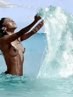 Black Megalyn Echikunwoke nude tits on a beach in Mexico Cel