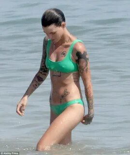 Bikini-clad Ruby Rose gets wet and wild on a Malibu beach Da