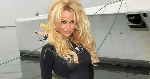 Pamela Anderson - Black Wetsuit Just FAB Celebs