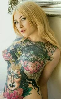 Girls tattoo on boobs