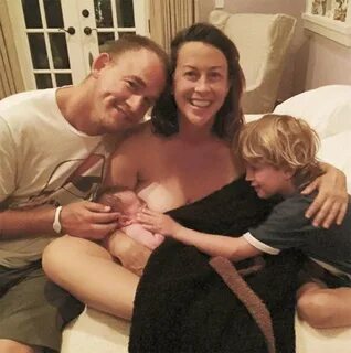 her husband Mario "Souleye" Treadway and their son Ever Imre sitt...