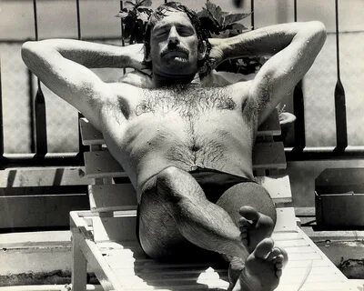 Dennis Lillee relaxes by the pool.