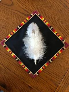 MGraves. Red Lake Nation Ojibwe Grad cap decorated, Beaded h