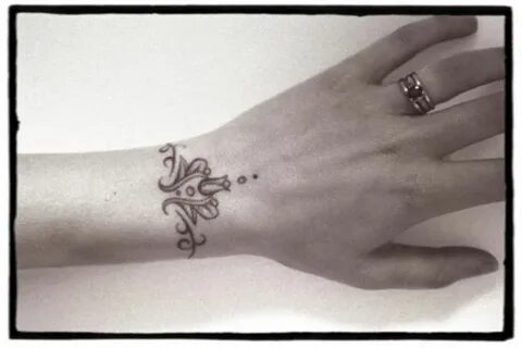 Tatto just like janis joplin's Wrist tattoos for guys, Polyn