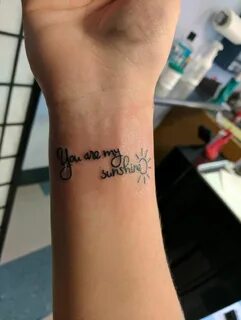 You are my sunshine tattoo. Font- Virginia Sky from dafonts.