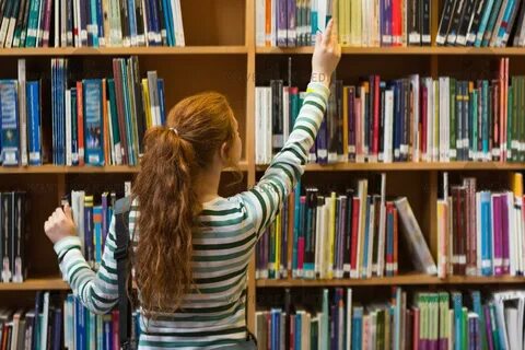 Girl Stripping In Library