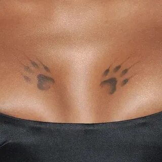 Eve's Paw Prints Chest Tattoo Steal Her Style