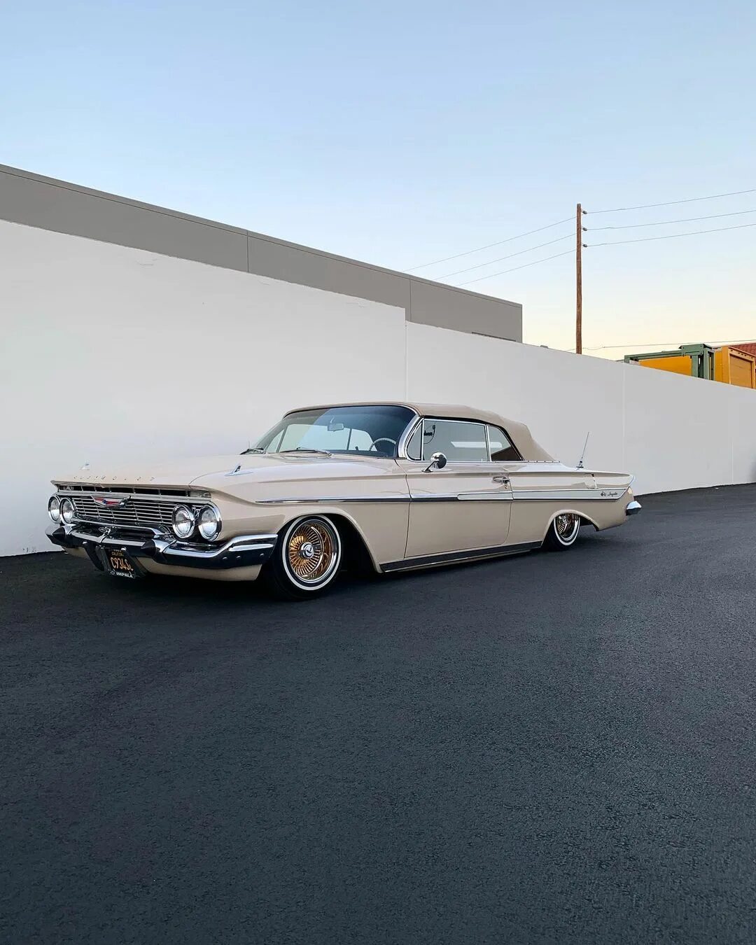 61 Impala with custom air trunk setup laced with 13" gold and chrome 1...