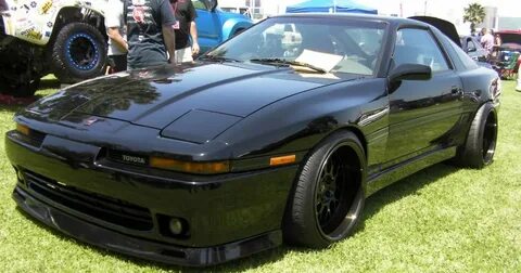 Here, have a wide-body MK3 Supra in black.