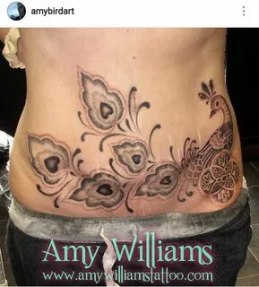 Dotwork peacock scar coverup stomach tattoo by Amy Williams.