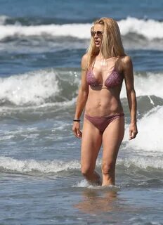 MICHELLE HUNZIKER in Bikini on Vacation in Forte Dei Marni 0