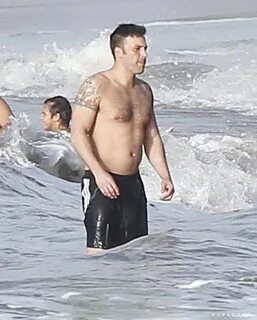 Shirtless Ben Affleck's arm tattoos were on display. Jennife