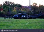 Soldiers from 1-89 Cavalry rush to get on a UH-60 Black Hawk