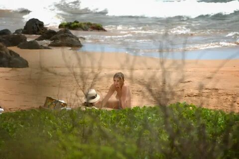 Ashley Benson caught topless at the beach in Hawaii
