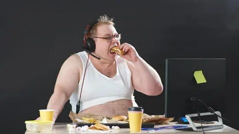 hungry overweight man eating hamburger while Stok Videosu (%