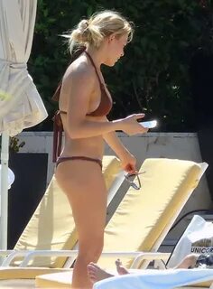 LeAnn Rimes looks hot in a brown thong bikini at the pool in